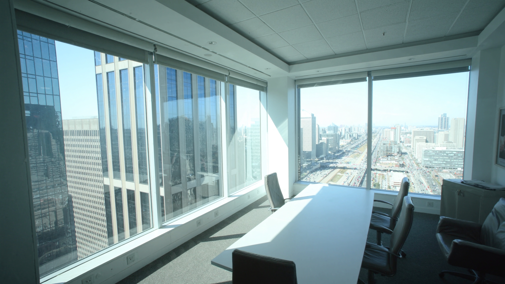 A split scene comparing a downtown Markham boardroom and a Highway 7 Class-A meeting room